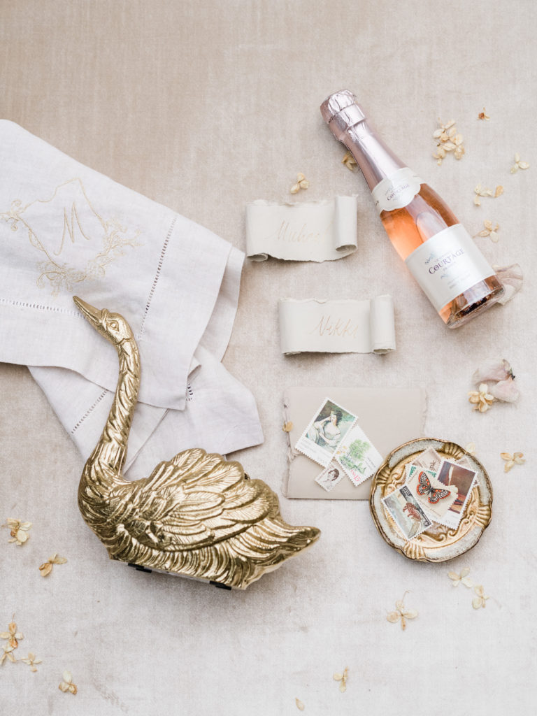 Fine art wedding day details with champagne photographed by Liz Andolina Photography