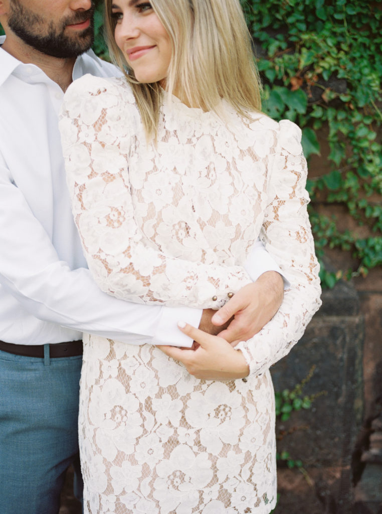 Chic couple embraces during their engagement session at Princeton University by Liz Andolina Photography
