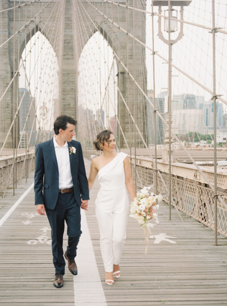Bride and groom on Brooklyn Bridge