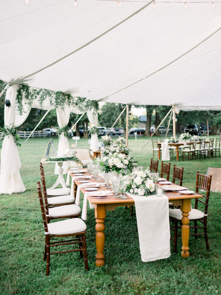 Elegant wedding reception in a tent at the Inn at Barley Sheaf Farm