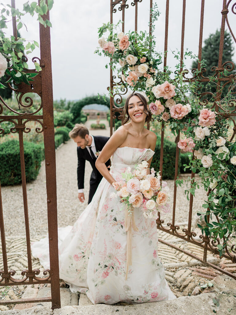 Floral gown and luxury flowers at wedding in Tuscany