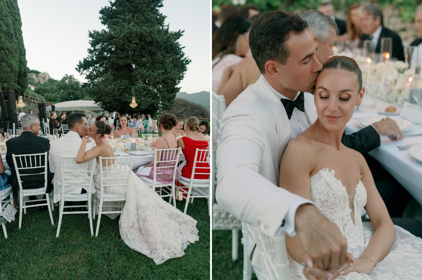 Bride and groom kissing while sitting at their reception table 